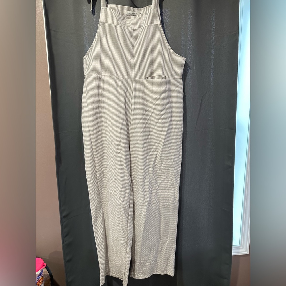 One piece romper. Light stripe. Lightweight material.